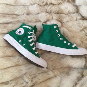 Brand new in box green high top Chuck Taylors